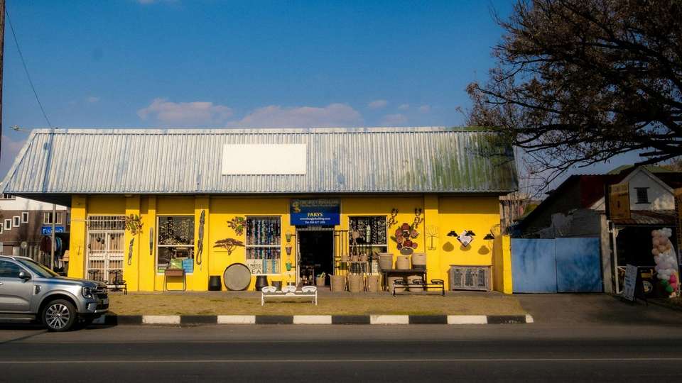A small yellow shop on a street in Parys, in the Free State
